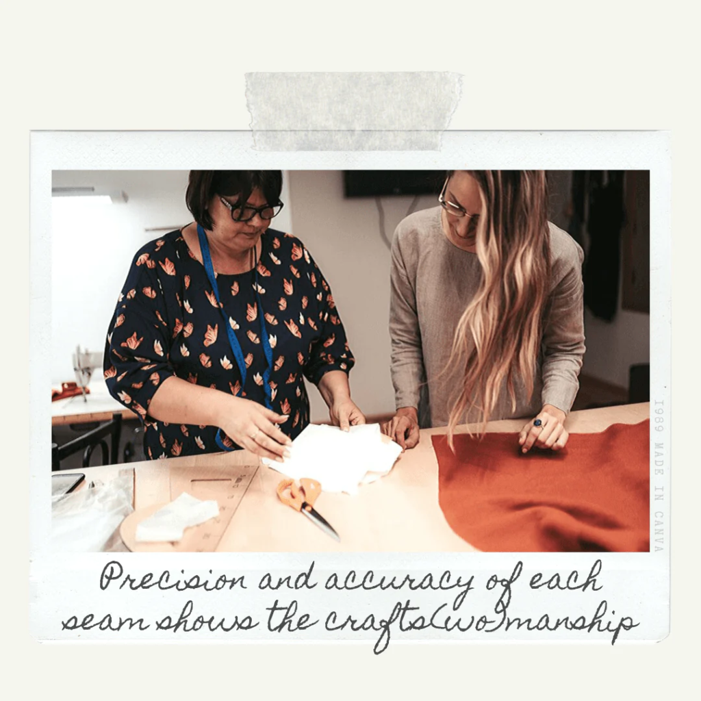 two women working on a dress