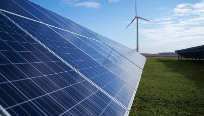Solar pannels and wind power plant outside