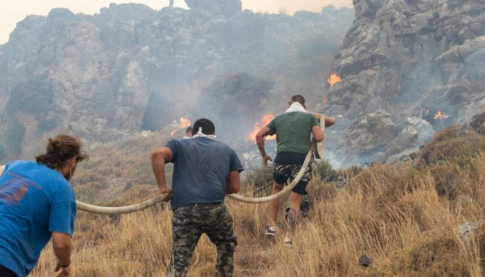 evacuation efforts amid historic heat wave and raging wildfires in Greece.
