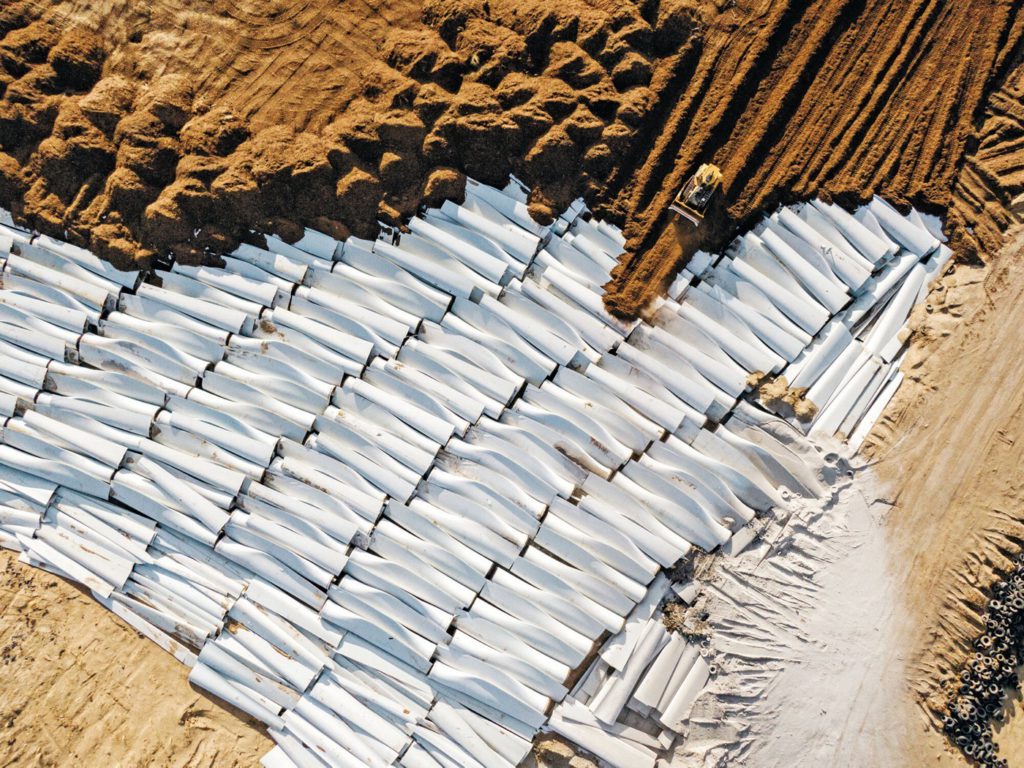 Fragments of wind turbine blades end up buried in landfills, like the one shown in the photo taken in Casper, Wyoming.