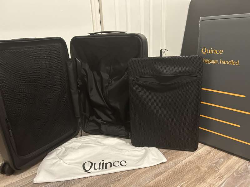 black colored quince luggage