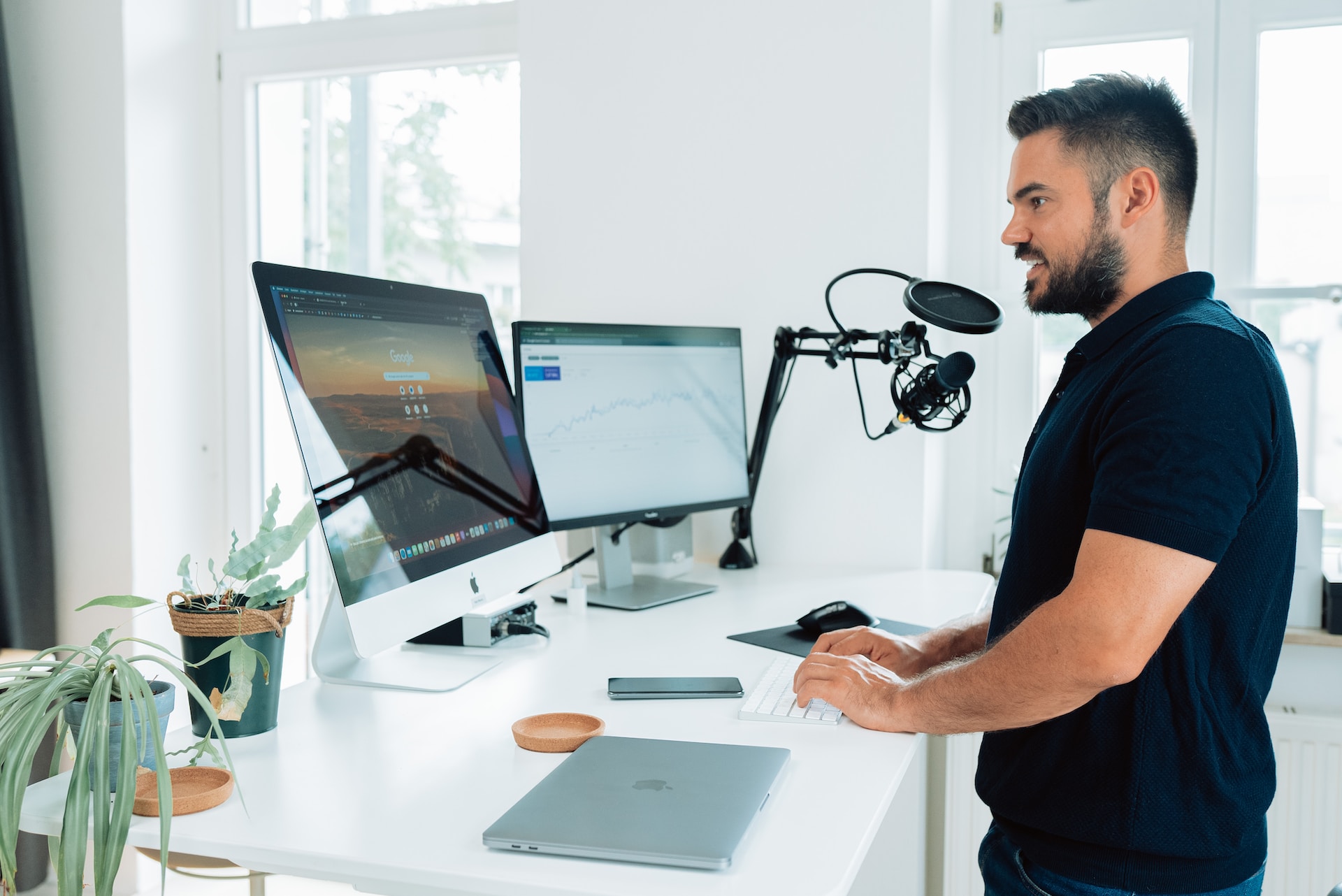 person podcasting in front of iMac