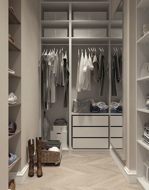 shirts and shoes in whitish wardrobe