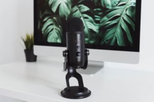 black mic on white table